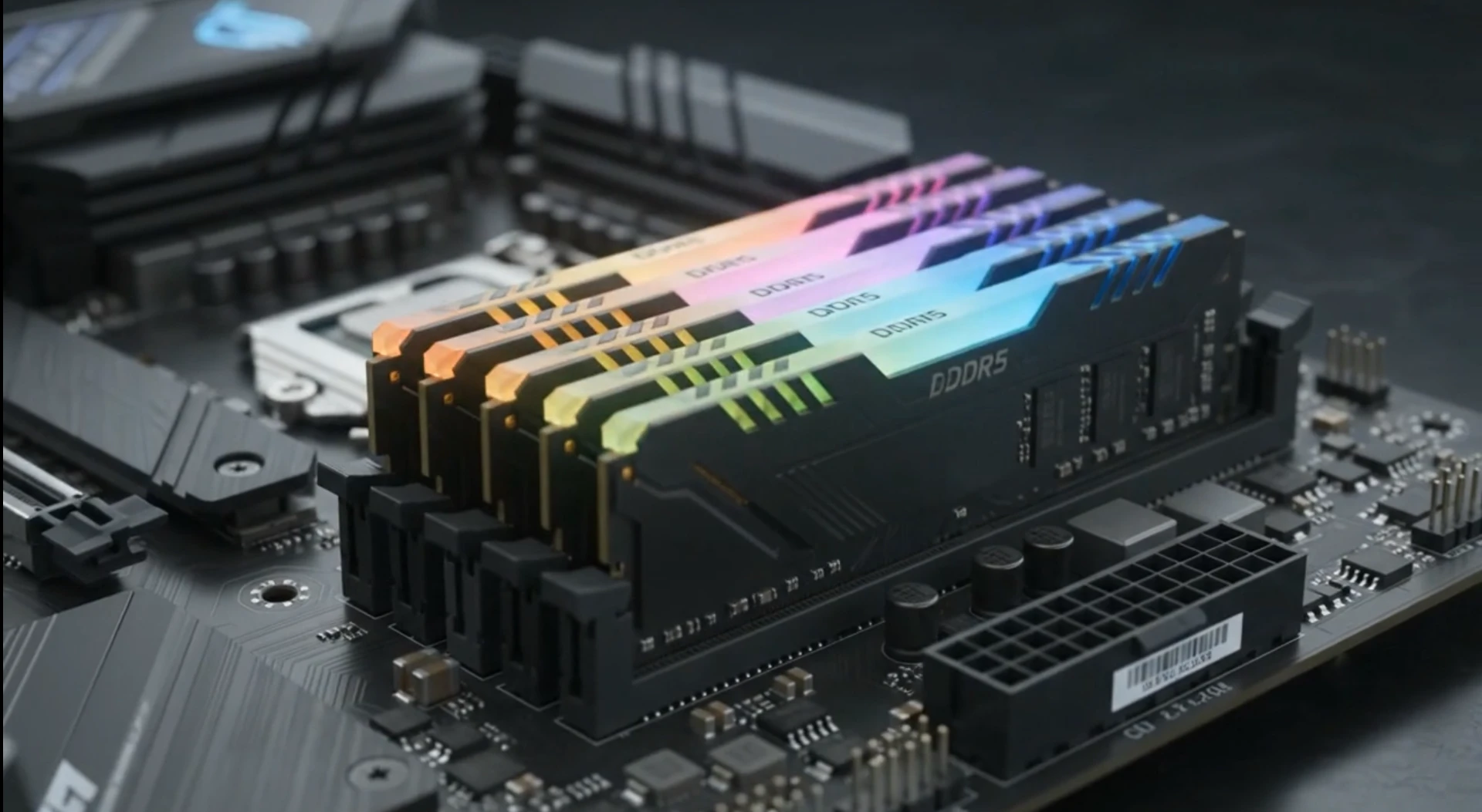 RGB DDR5 memory modules seated in a motherboard during bench testing